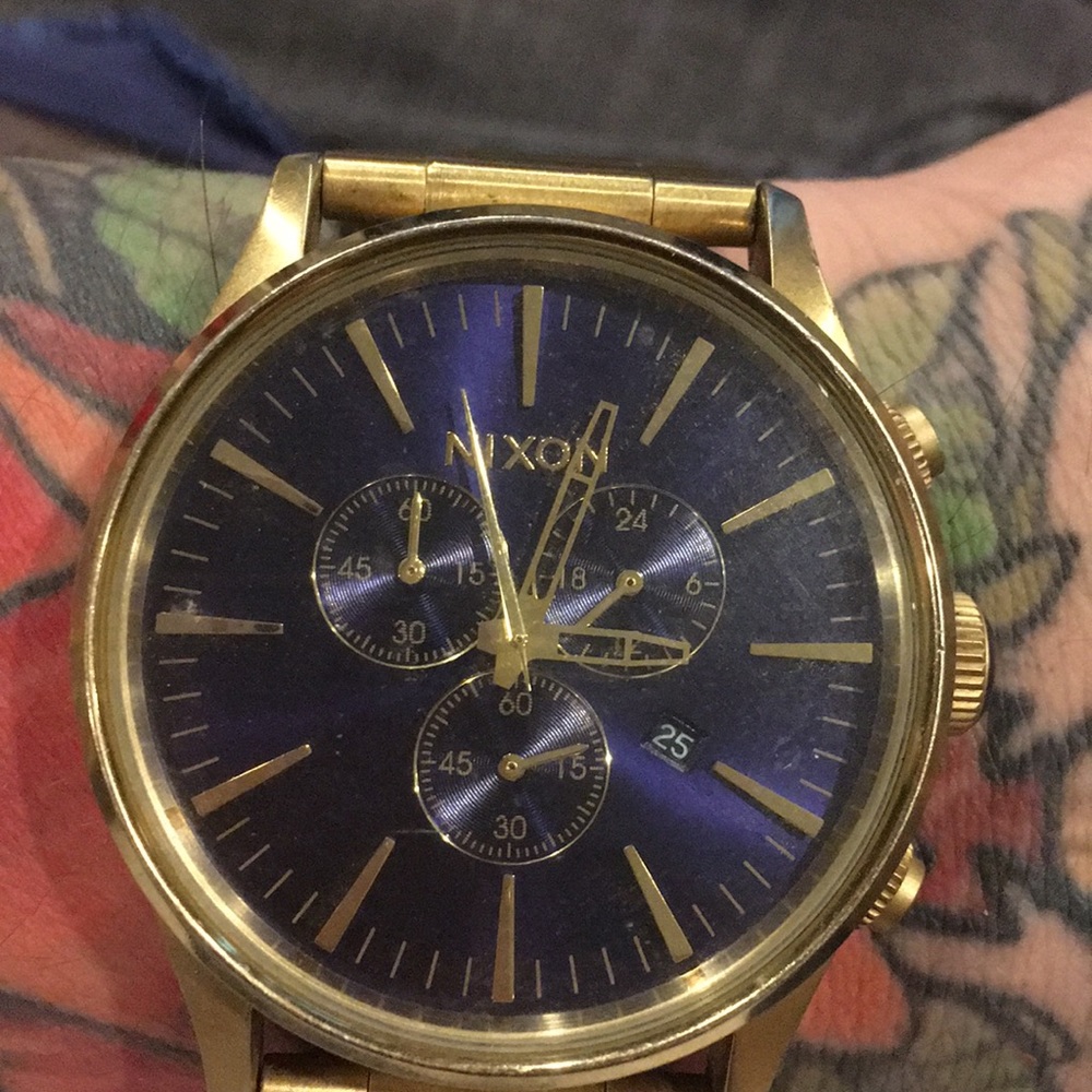 Nixon 10k gold watch